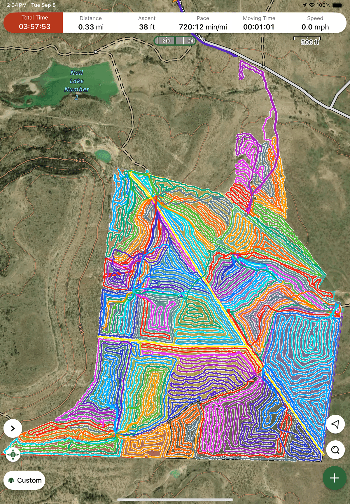 Satellite map showing GPS machine tracks across every worked acre of a completed grubbing job.