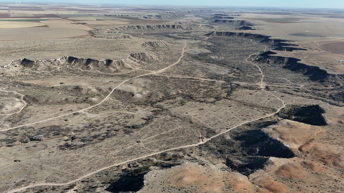 Aerial view of shapefile-designed brush clearing through canyon country on a private ranch in Floyd County, Texas.